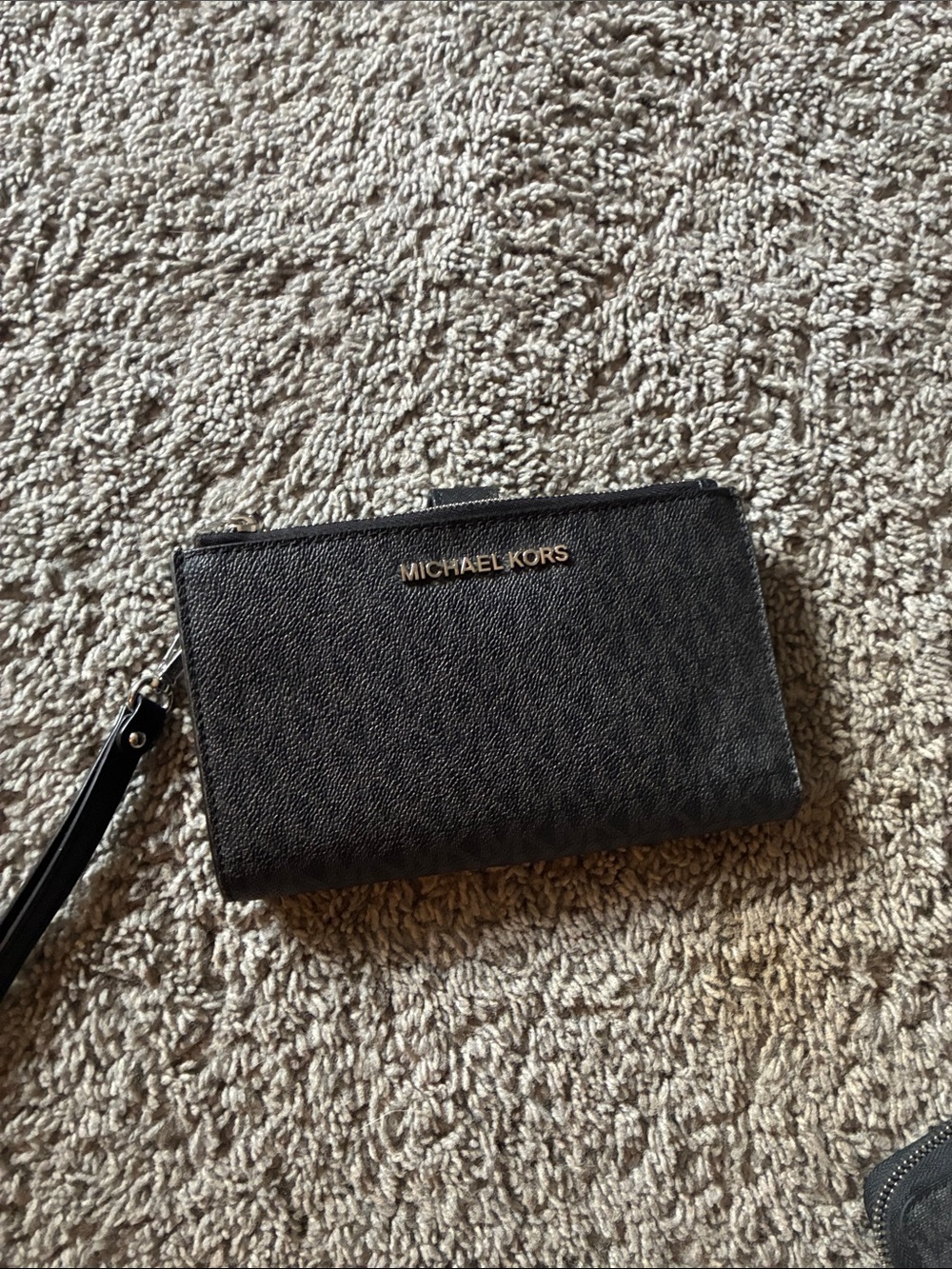 Michael Kors Black Textured Wristlet Card Holder with silver logo, like new, use